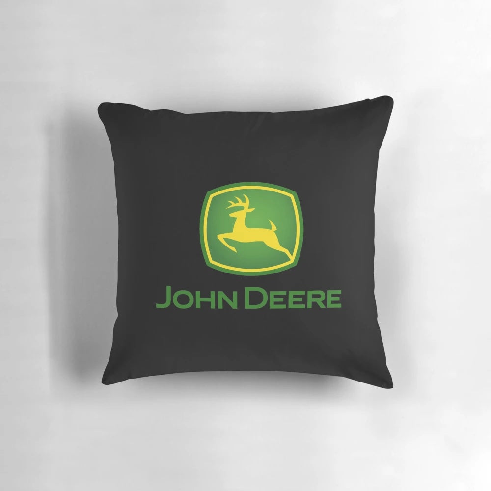 A plush, green pillow with a John Deere-inspired design, perfect for farm and agriculture enthusiasts.