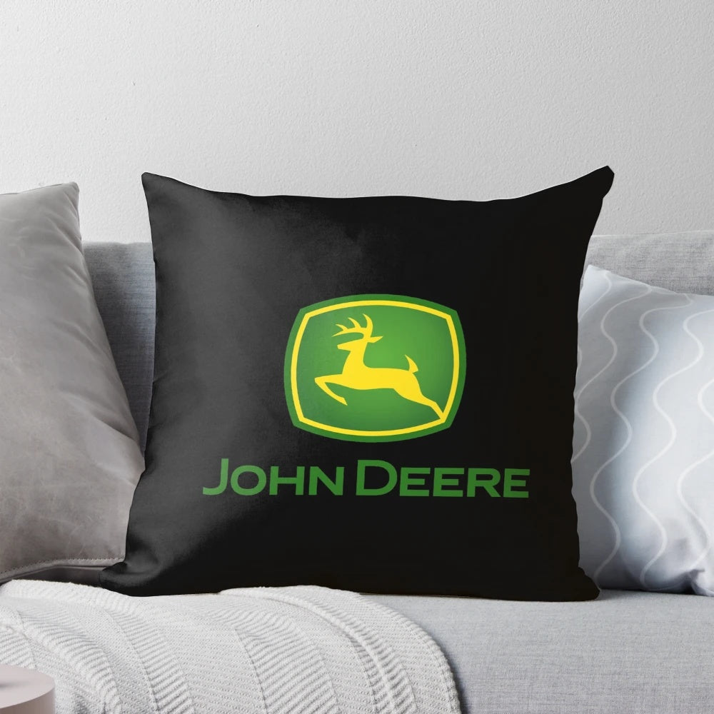 A plush, green pillow with a John Deere-inspired design, perfect for farm and agriculture enthusiasts.