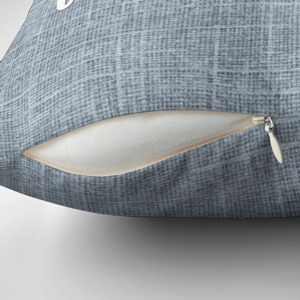 Decorative dog-themed pillow in grey and white colors