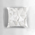 Soft, grey decorative pillow with a modern pattern of lines, triangles, and butterflies