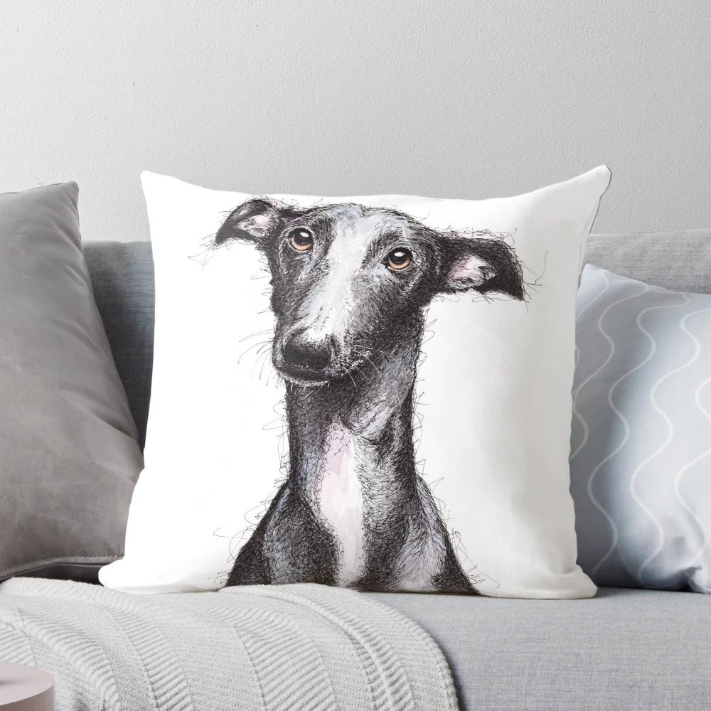 Beautiful black greyhound looking soulful on a decorative throw pillow
