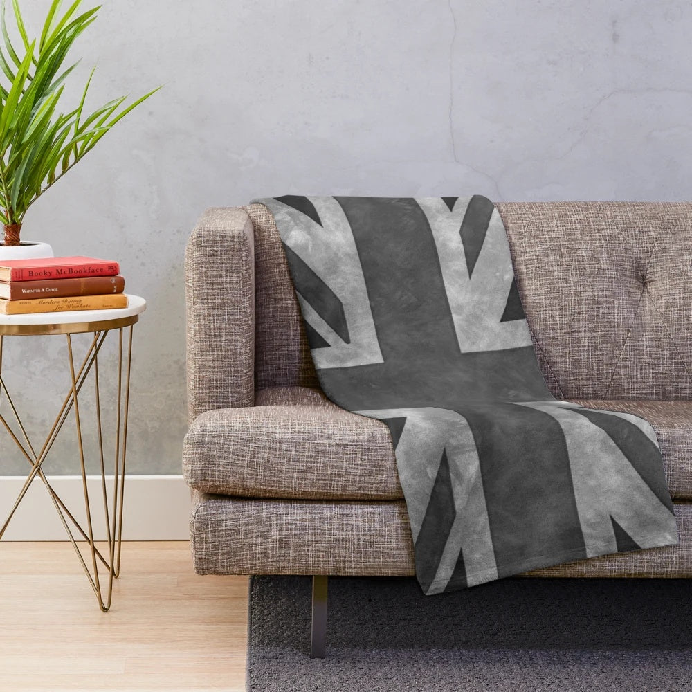 Greyscale plush blanket with distressed union jack design