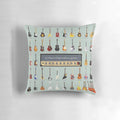 A decorative pillow featuring a print of various types of guitars