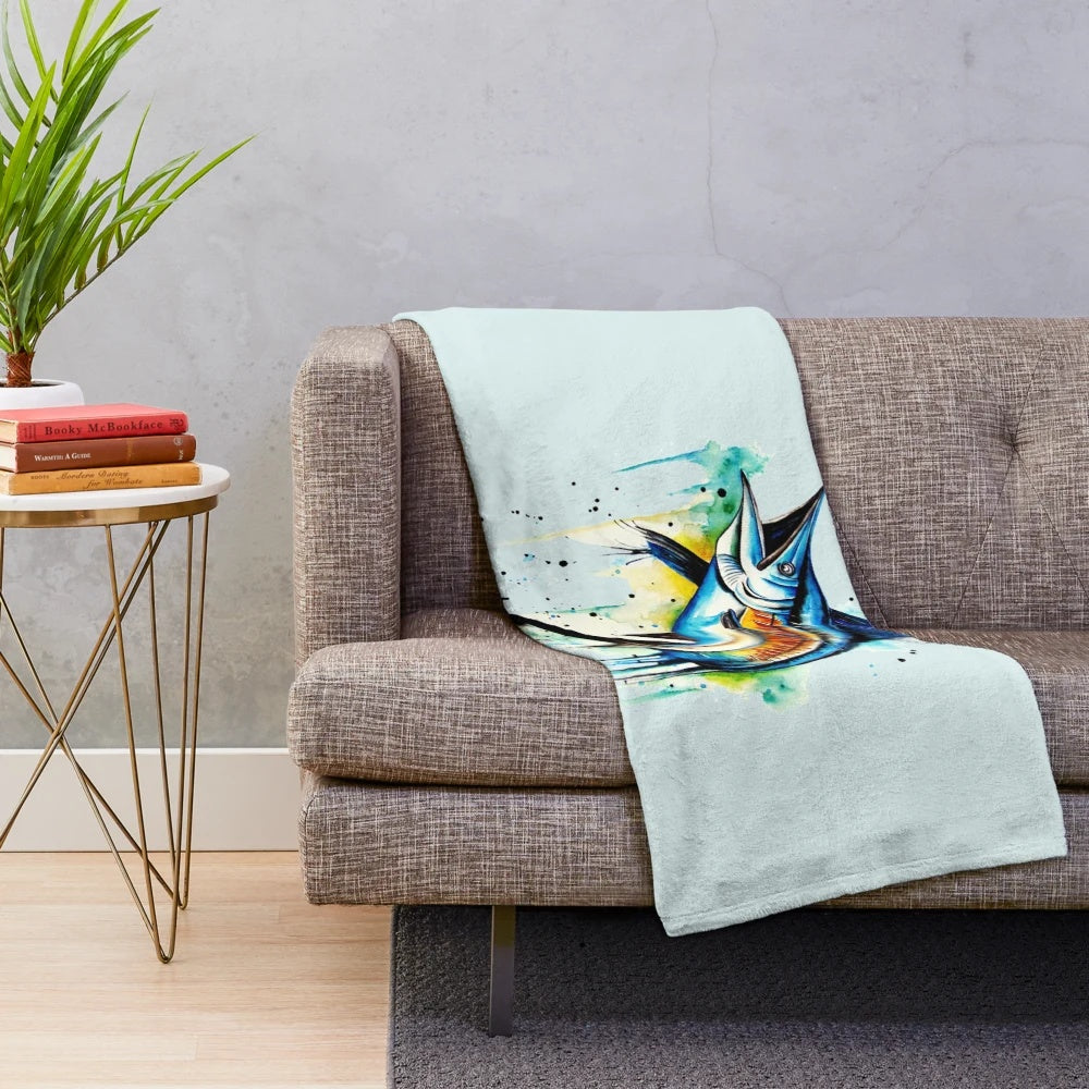 Guy Harvey inspired plush blanket with racing and music motifs