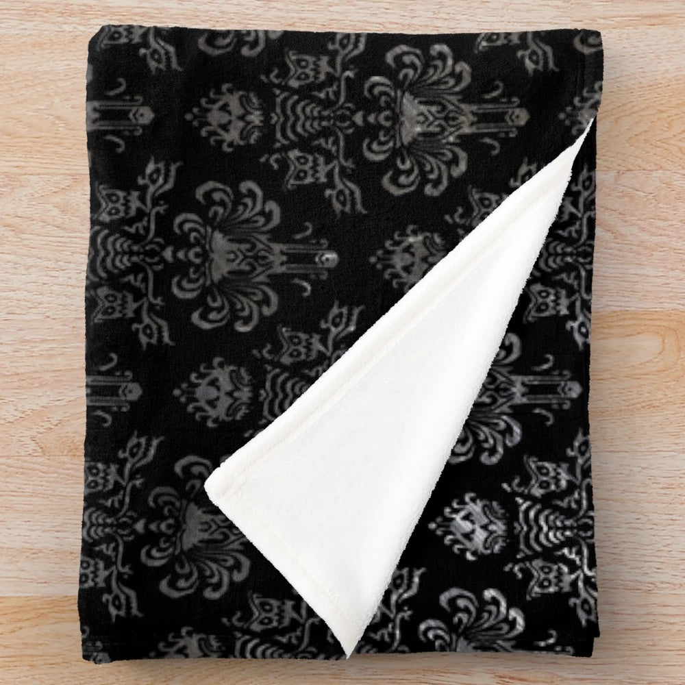 Haunted Mansion inspired plush blanket in black and silver pattern