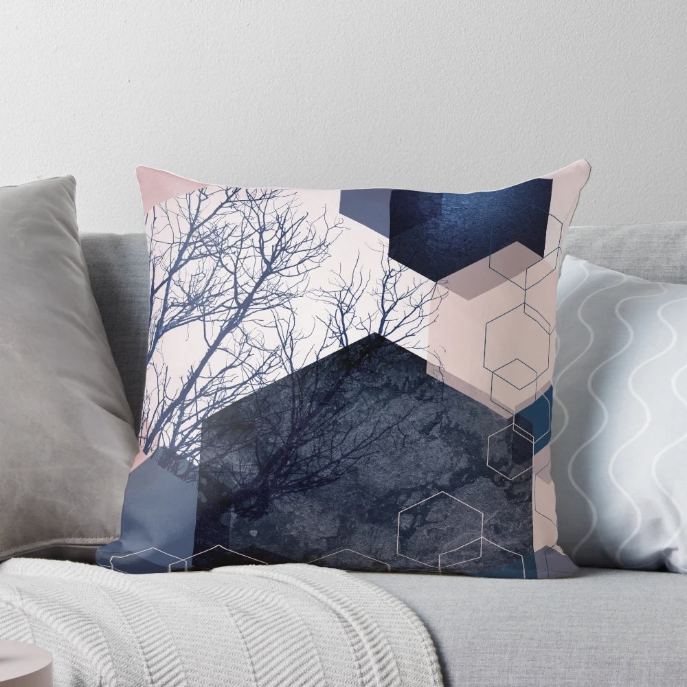 Hexagon-patterned landscape pillow in blush pink and navy blue
