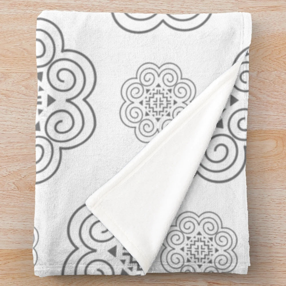 Monochrome Hmong symbol design printed on a soft and cozy plush blanket