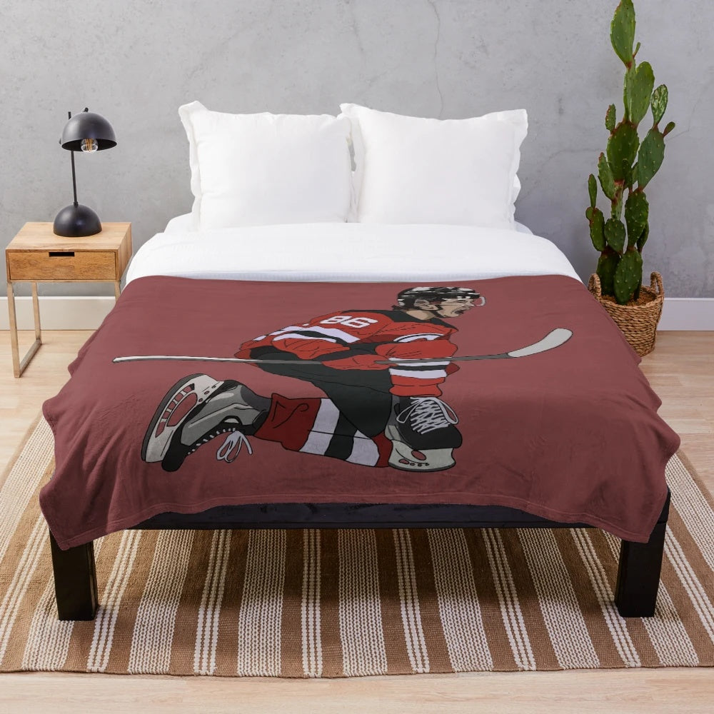 Jack Hughes-inspired plush blanket in black and red colors