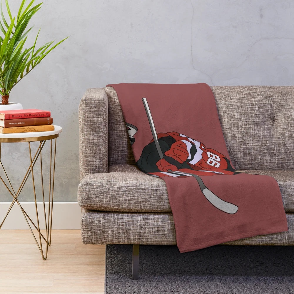Jack Hughes-inspired plush blanket in black and red colors