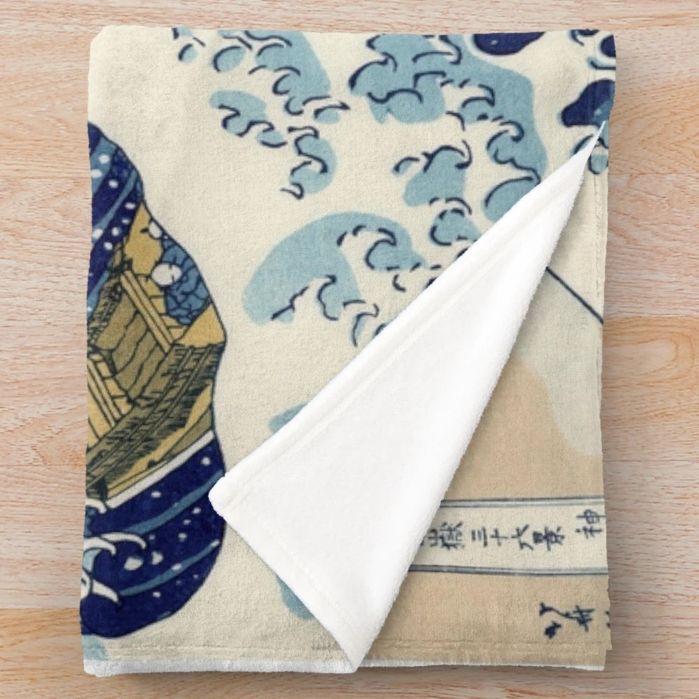 Plush blanket with the famous Great Wave off Kanagawa artwork