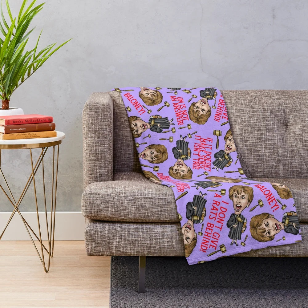 Purple plush blanket featuring a Judge Judy inspired pattern