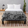 Cozy KISS band-themed plush blanket with the band's iconic logo and member names