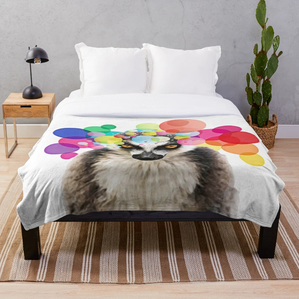 Colorful pop art depiction of a lemur on a plush blanket