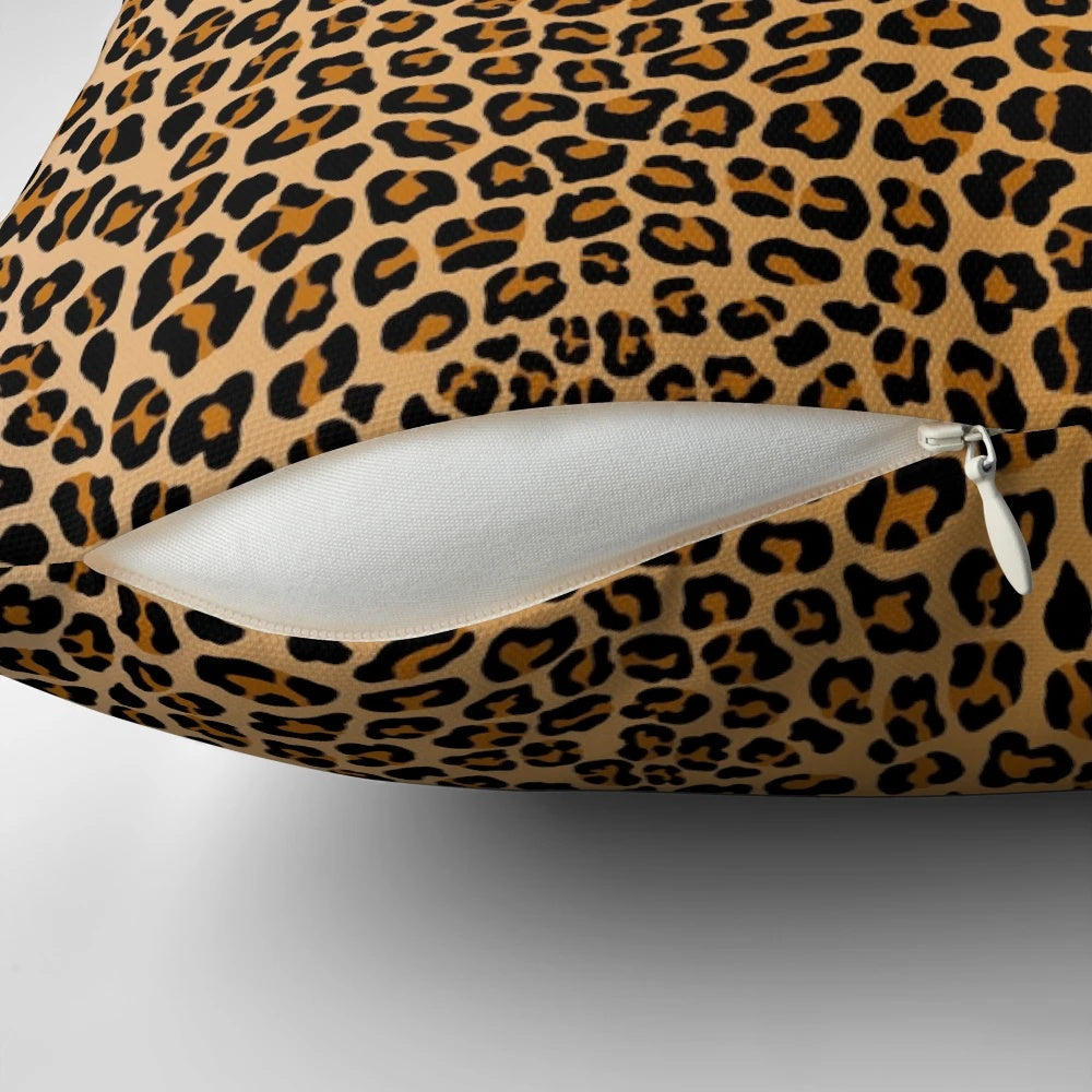 Leopard print pillow with a trendy, exotic design that adds a touch of safari-chic to any space.