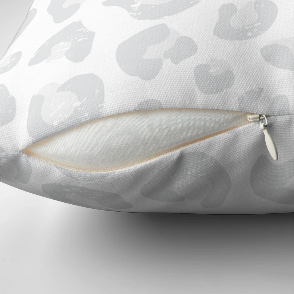 Leopard print decorative pillow in silver gray and white colors