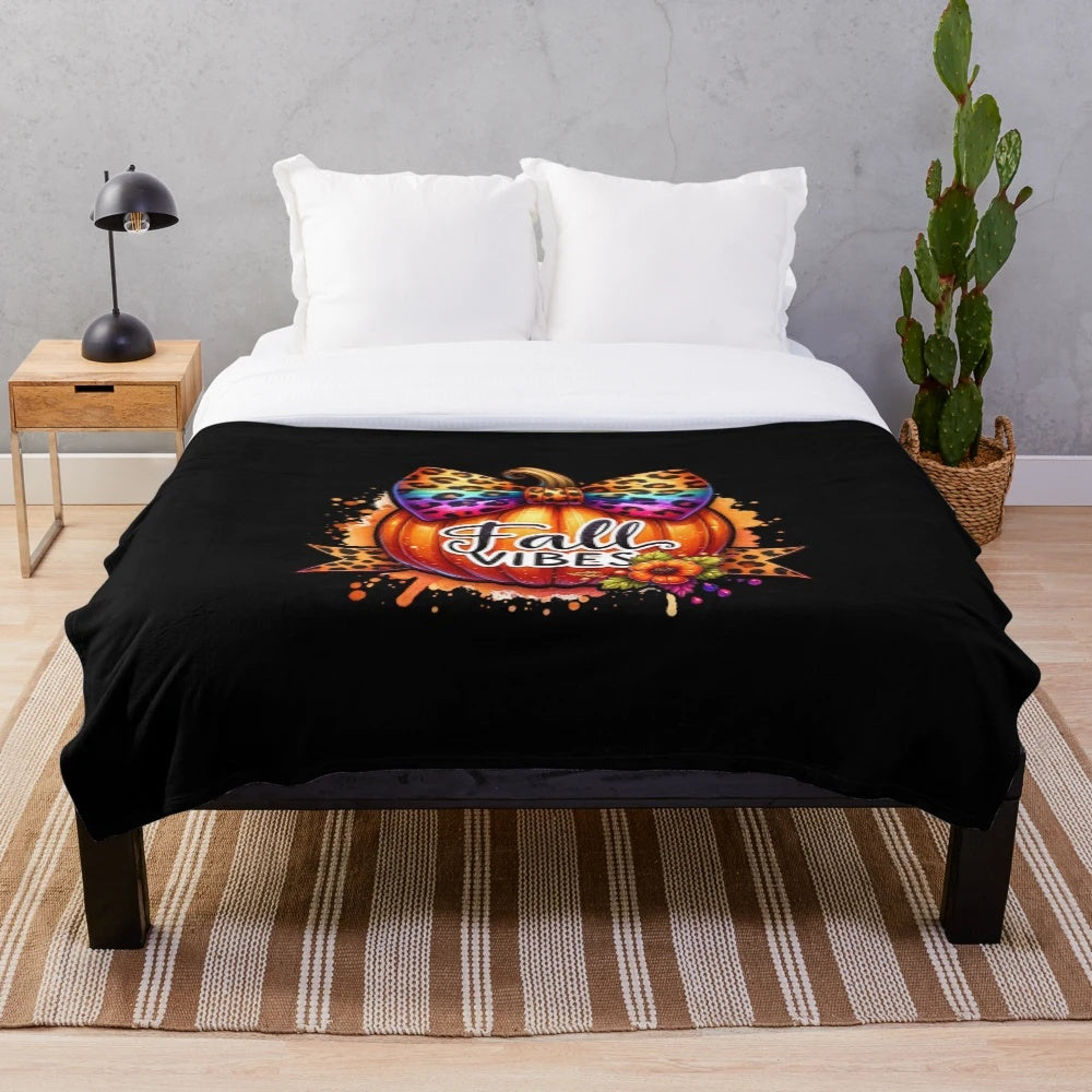 Leopard print pumpkin watercolor art on a soft plush blanket