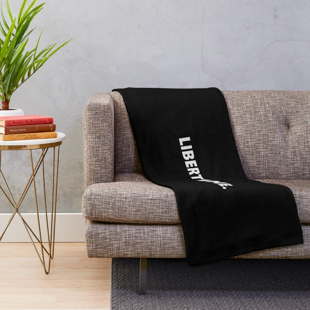 Libertine-inspired plush blanket featuring a cozy, soft design