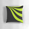 Lime green pillow with a wave design on a black background