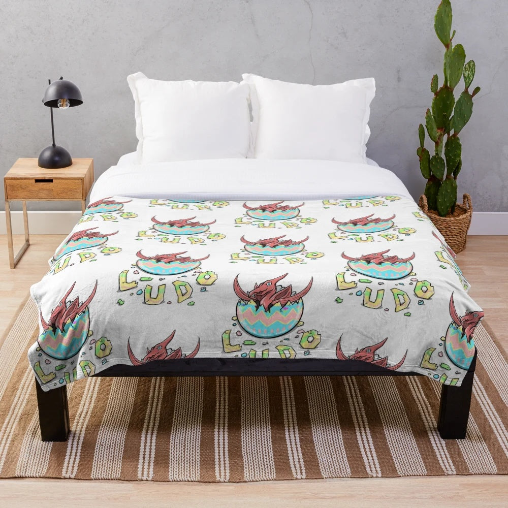LUDO-inspired baby plush blanket featuring an Easter pterodactyl design