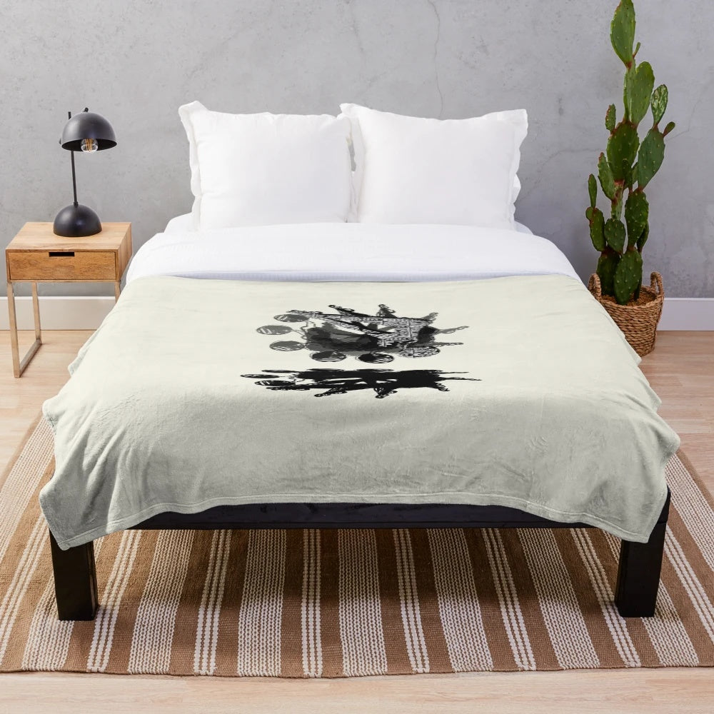 Plush mandala-patterned blanket with a kaleidoscope design