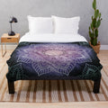 Stylish mandala patterned plush blanket in teal and purple colors