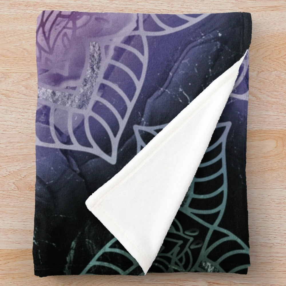 Stylish mandala patterned plush blanket in teal and purple colors