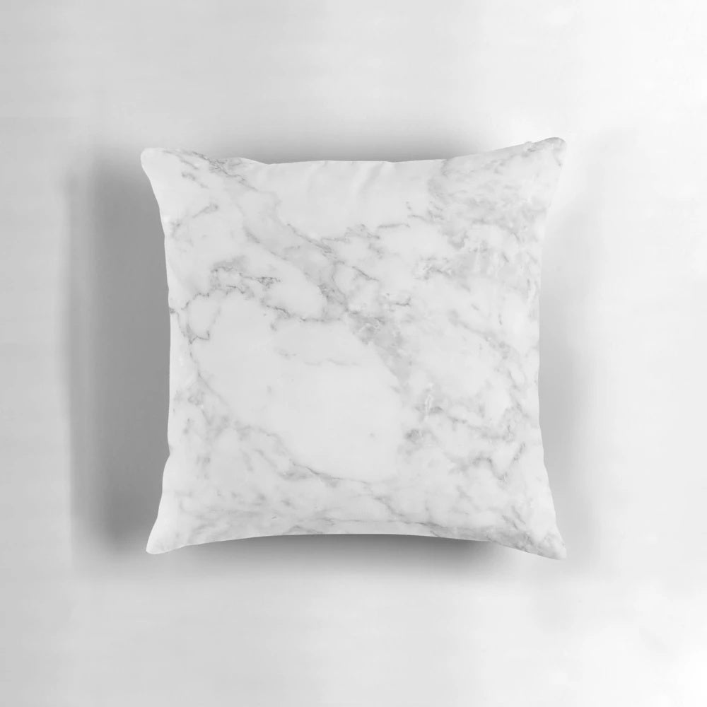 Marble-patterned decorative pillow in neutral colors