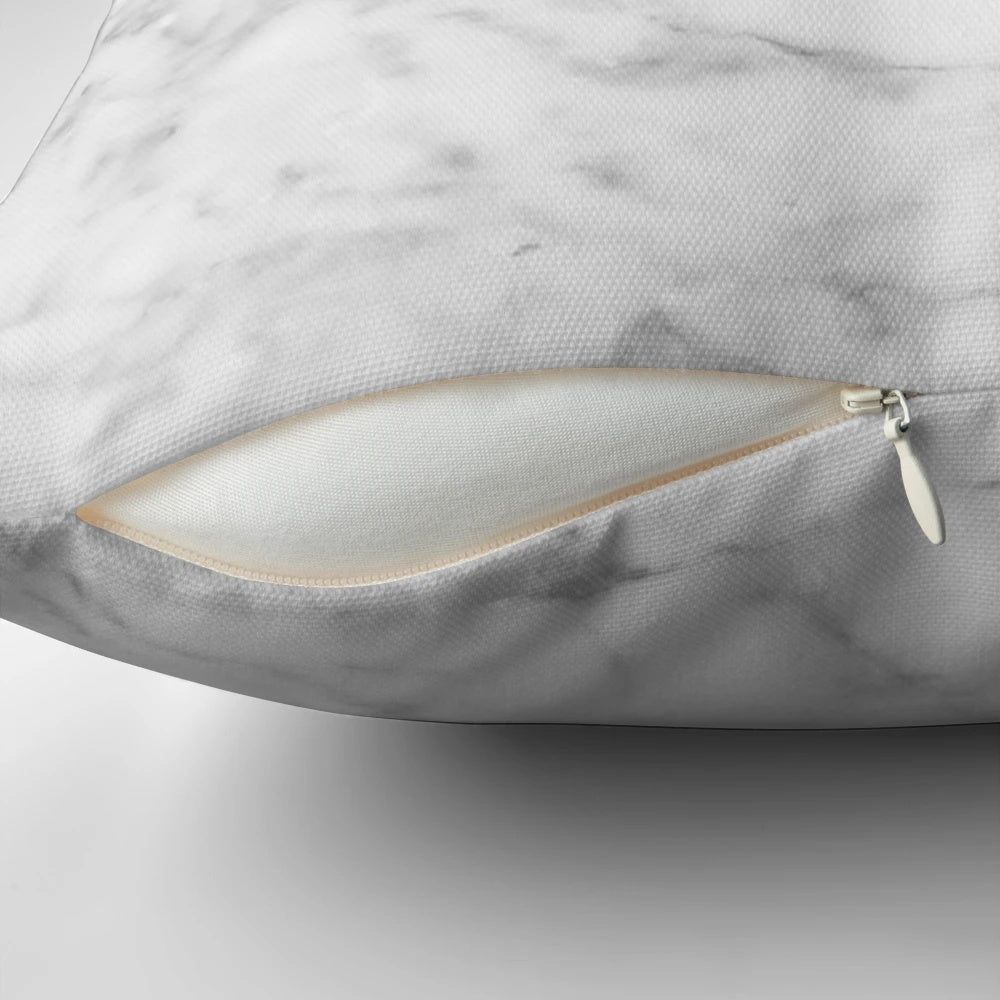 Marble-patterned decorative pillow in neutral colors