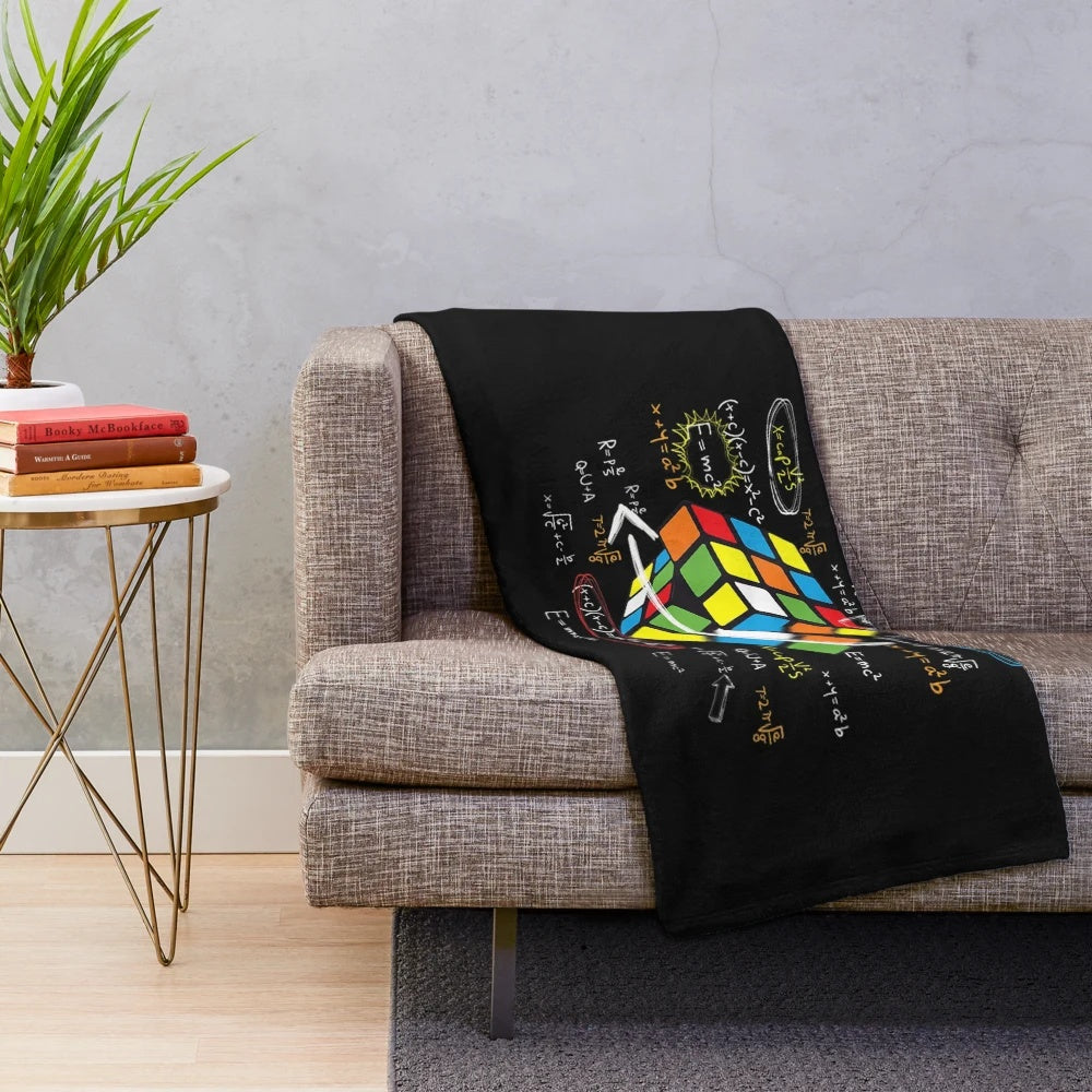 Plush blanket with cool math-themed Rubik's cube design