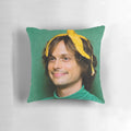 Plush pillow featuring a playful image of actor Matthew Gray Gubler holding a banana