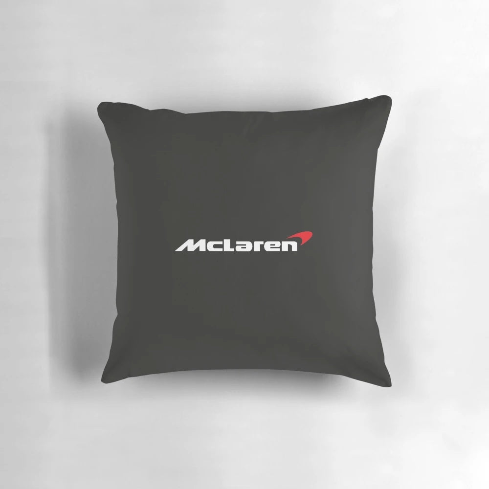 Pillow featuring the iconic Mclaren Racing logo, perfect for Formula 1 and automotive fans.