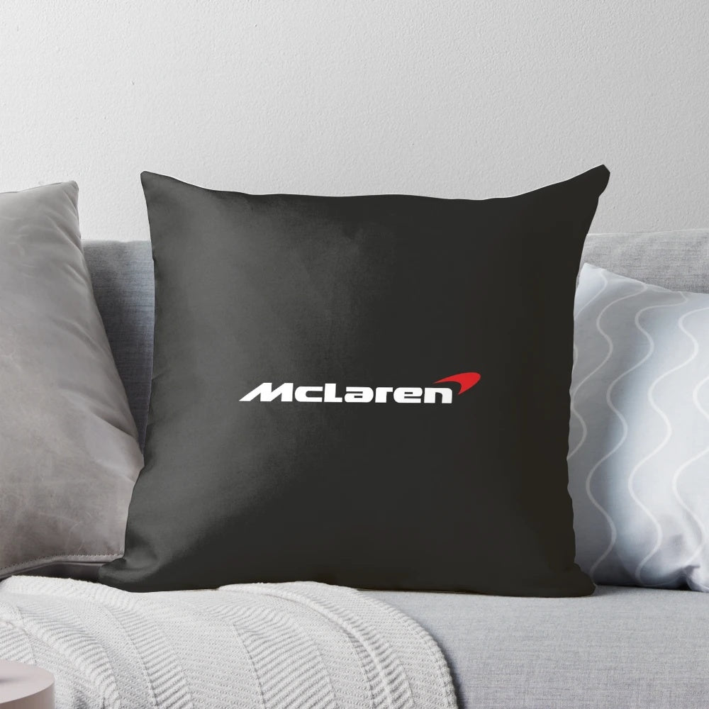 Pillow featuring the iconic Mclaren Racing logo, perfect for Formula 1 and automotive fans.