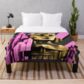 Plush blanket featuring a futuristic Metropolis city scene in pink, black, gold, and beige