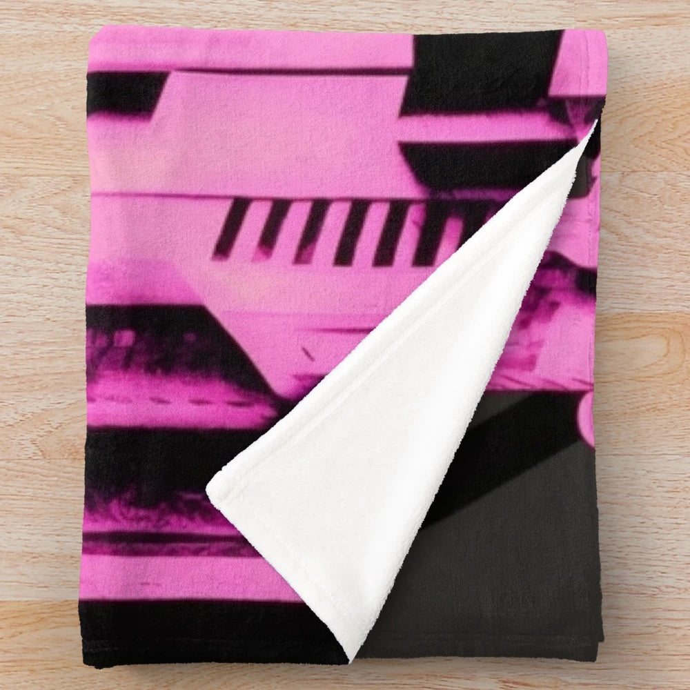 Plush blanket featuring a futuristic Metropolis city scene in pink, black, gold, and beige