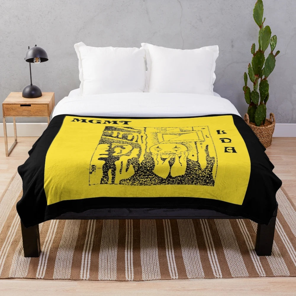 MGMT-inspired plush blanket featuring the band's logo and artwork