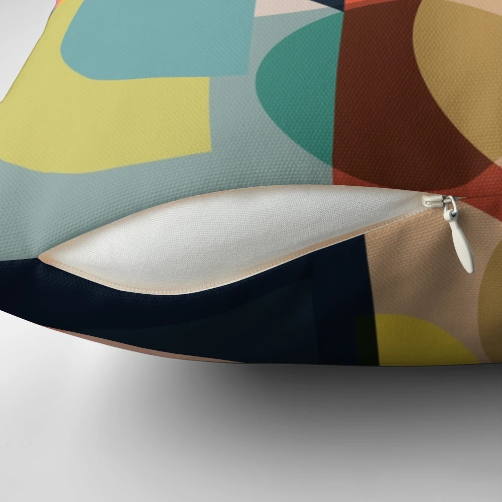 Set of four mid century design throw pillows with abstract patterns