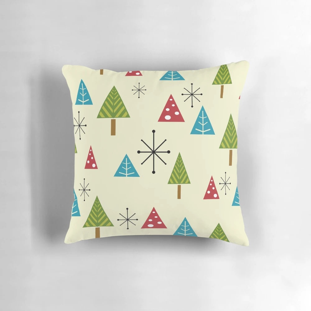 Decorative pillow featuring a mid century modern abstract Christmas tree design