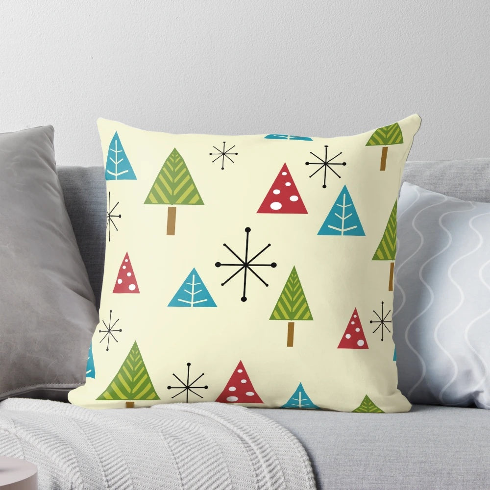 Decorative pillow featuring a mid century modern abstract Christmas tree design
