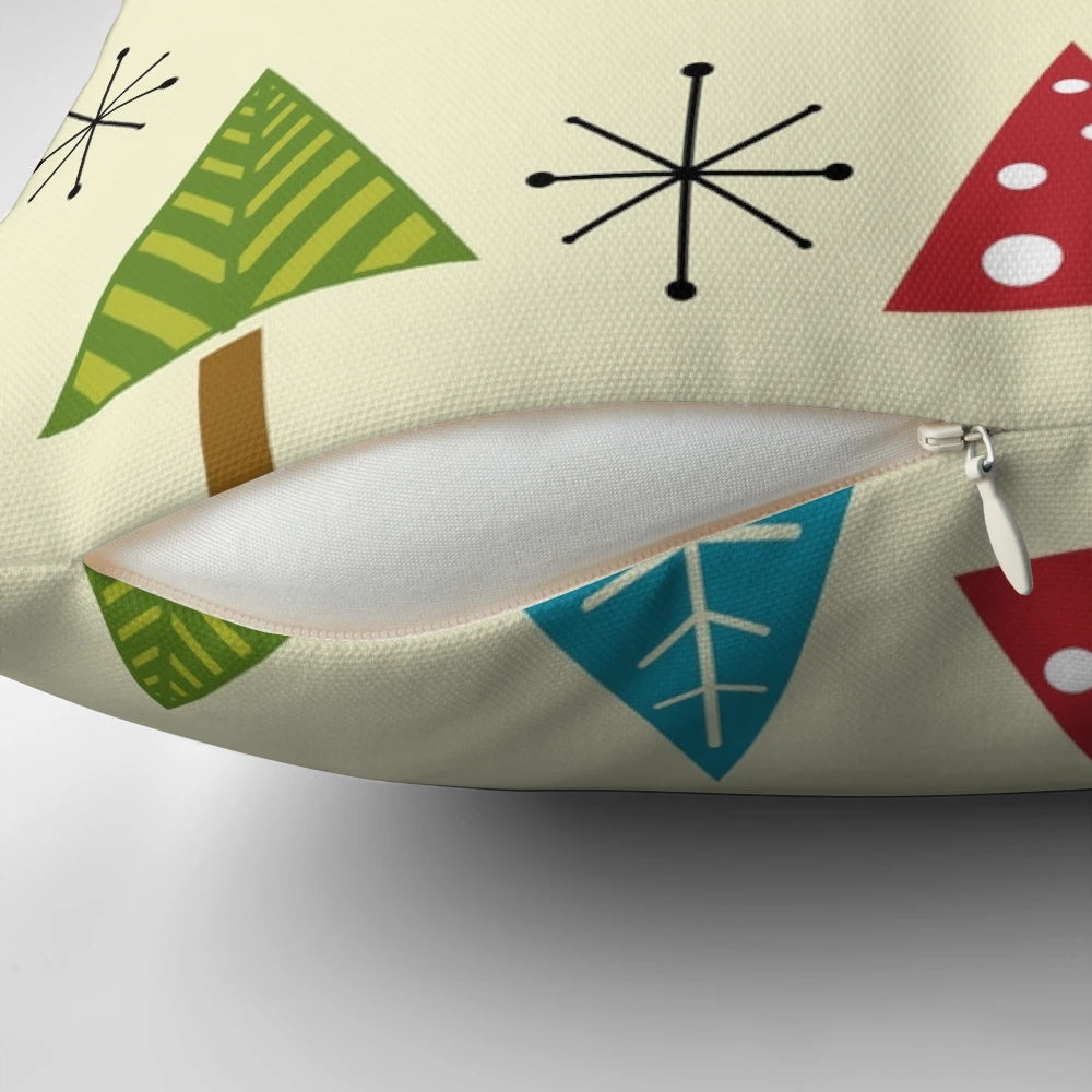 Decorative pillow featuring a mid century modern abstract Christmas tree design