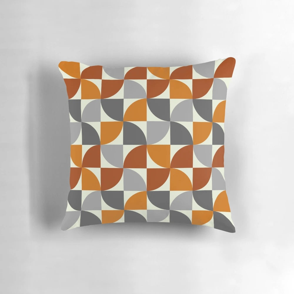 Mid century modern style throw pillow with a geometric pattern in grey and orange colors