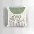 A mid-century modern style green throw pillow with an abstract, geometric retro pattern.
