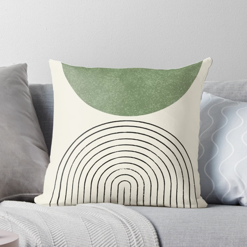 A mid-century modern style green throw pillow with an abstract, geometric retro pattern.