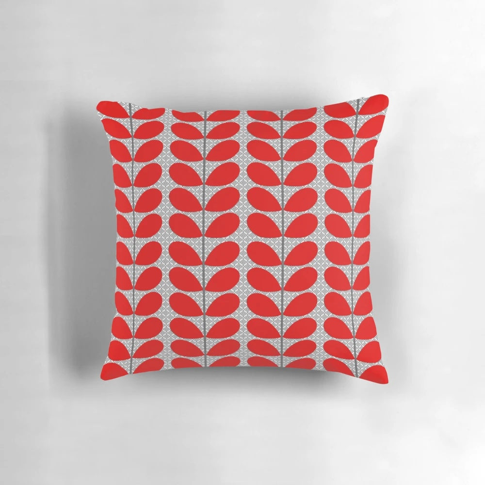 Decorative throw pillow featuring a mid-century modern abstract leaf design in a rich deep red and gray color scheme
