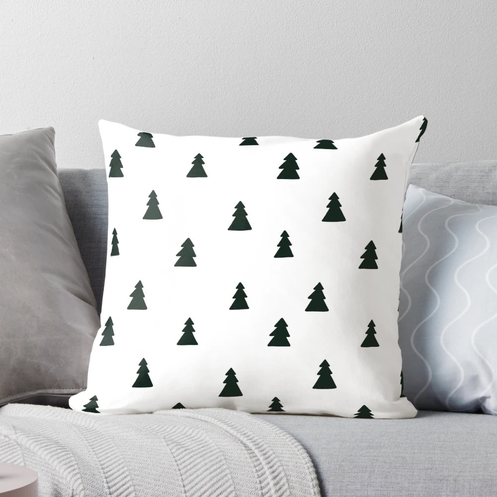 A black and white modern minimalist Christmas tree pattern pillow.