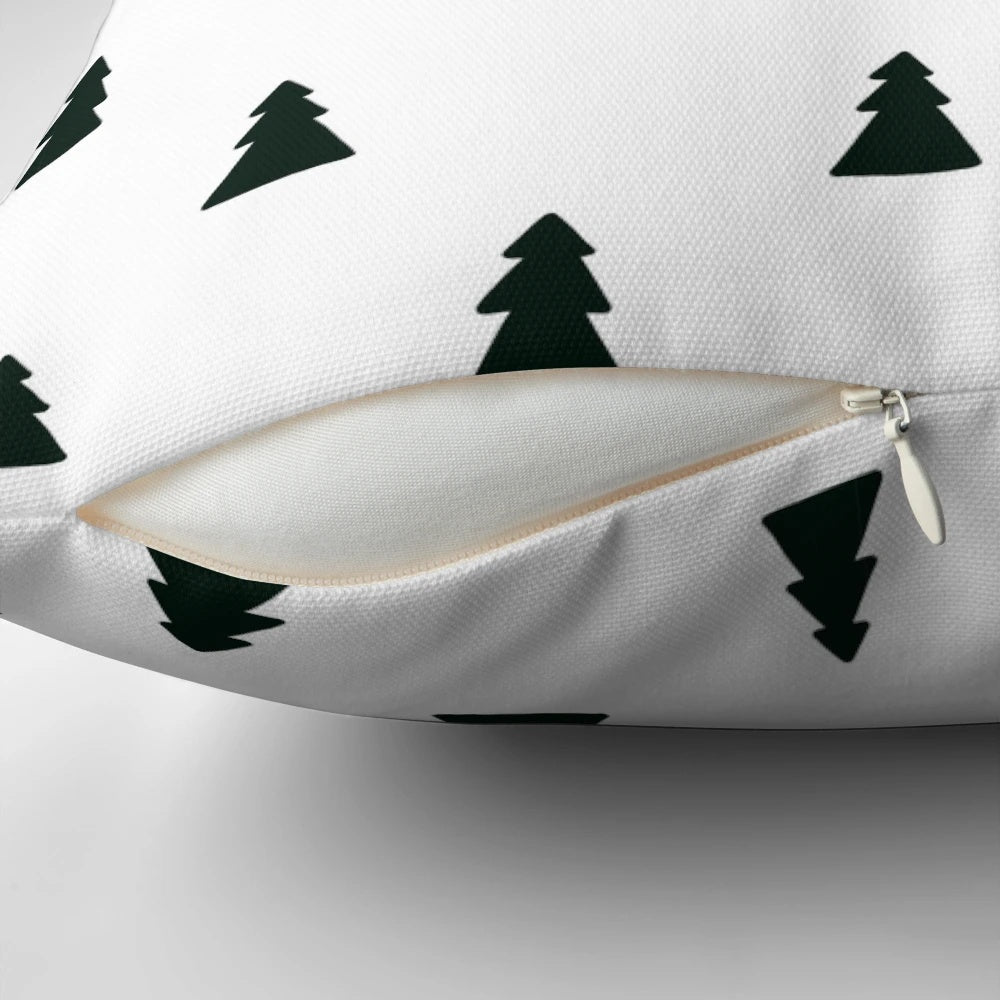 A black and white modern minimalist Christmas tree pattern pillow.