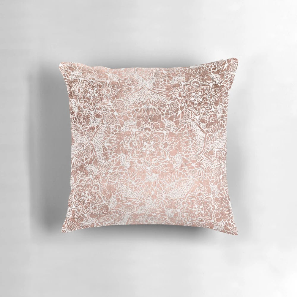 Modern floral mandala design pillow with rose gold and white color scheme