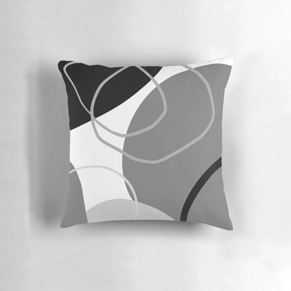 Modern retro abstract boho pillow in grey, black, and white colors with geometric shapes
