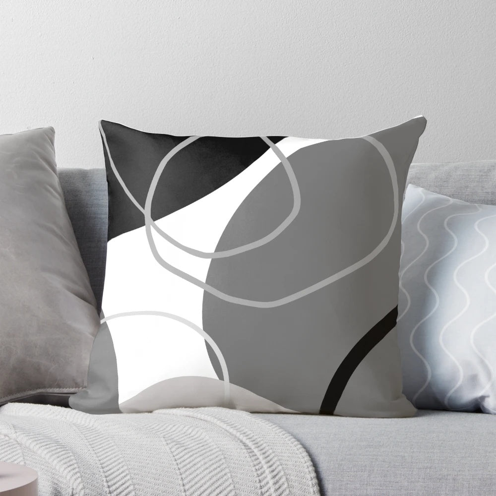 Modern retro abstract boho pillow in grey, black, and white colors with geometric shapes