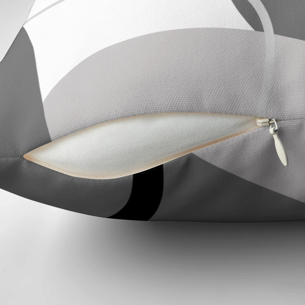 Modern retro abstract boho pillow in grey, black, and white colors with geometric shapes