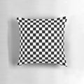 Black and white checkered pattern pillow with a classic checkerboard design
